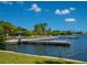 Fishing pier with calm waters and beautiful surroundings at 100 Sands Point Rd # 305, Longboat Key, FL 34228