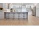 Modern kitchen with stainless steel appliances at 100 Sands Point Rd # 305, Longboat Key, FL 34228