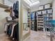 Large walk-in closet with ample shelving and hanging space at 100 Sands Point Rd # 305, Longboat Key, FL 34228