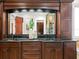 Double vanity with dark wood cabinets and granite countertop at 3544 San Remo Ter, Sarasota, FL 34239
