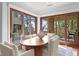 Bright dining room with water views and sliding doors at 3544 San Remo Ter, Sarasota, FL 34239