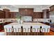Gourmet kitchen with large island and custom cabinetry at 3544 San Remo Ter, Sarasota, FL 34239