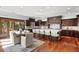 Spacious kitchen with large island and hardwood floors at 3544 San Remo Ter, Sarasota, FL 34239