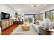 Relaxing living area with water views and custom furnishings at 3544 San Remo Ter, Sarasota, FL 34239