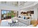 Spacious living room with high ceilings and water views at 3544 San Remo Ter, Sarasota, FL 34239
