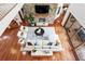 Large living room with stone fireplace and hardwood floors at 3544 San Remo Ter, Sarasota, FL 34239
