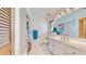 Updated bathroom with a vanity, toilet, and a shower/tub combo at 1415 Piedmont Rd, Venice, FL 34293