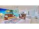 Open living space with a view of the kitchen and dining area at 1415 Piedmont Rd, Venice, FL 34293