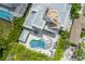 Bird's-eye view of house, deck, and kidney-shaped pool and spa at 149 Mckinley Dr, Sarasota, FL 34236