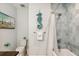 Charming bathroom with a tub and shower, and beach-themed decor at 149 Mckinley Dr, Sarasota, FL 34236