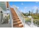 Exterior staircase leading to a rooftop deck and backyard at 149 Mckinley Dr, Sarasota, FL 34236