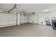 Spacious two-car garage with epoxy flooring and ample storage at 149 Mckinley Dr, Sarasota, FL 34236