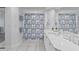 Clean bathroom, featuring a shower/tub combo and white vanity at 3702 54Th W Dr # 102, Bradenton, FL 34210