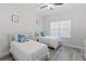 Bright bedroom with two twin beds and large window at 3702 54Th W Dr # 102, Bradenton, FL 34210