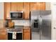 Well-equipped kitchen featuring stainless steel appliances at 6918 Grand Estuary Trl # 102, Bradenton, FL 34212