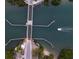 Aerial view of a bridge over a waterway with boat at 207 Woodland Dr # 207, Osprey, FL 34229