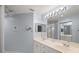 Spacious bathroom featuring double vanity sinks and a well lit mirror at 6736 Fairview Ter # 6736, Bradenton, FL 34203