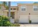 Townhome exterior featuring a well-maintained facade and attached garage at 6736 Fairview Ter # 6736, Bradenton, FL 34203