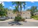 Exterior view of townhome with driveway and lush landscaping at 6736 Fairview Ter # 6736, Bradenton, FL 34203