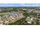 Aerial view showing home location near lake and community at 6309 75Th E Ave, Palmetto, FL 34221