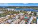 Aerial view of new construction home near beach, tennis courts, and waterway at 1150 Windsong Ln # 200, Sarasota, FL 34242
