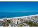 Beachfront high-rise buildings and white sand beach at 1150 Windsong Ln # 200, Sarasota, FL 34242