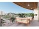Relaxing balcony with outdoor furniture and city view at 1150 Windsong Ln # 200, Sarasota, FL 34242