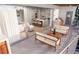 Outdoor balcony with seating area and kitchen access at 1150 Windsong Ln # 200, Sarasota, FL 34242