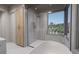 Modern bathroom with walk-in shower and soaking tub at 1150 Windsong Ln # 200, Sarasota, FL 34242
