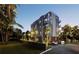 New construction home exterior, modern design, near lush landscaping at 1150 Windsong Ln # 200, Sarasota, FL 34242
