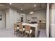 Modern kitchen with island, stainless steel appliances, and ample cabinetry at 1150 Windsong Ln # 200, Sarasota, FL 34242
