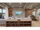Spacious living room, hardwood floors, open floor plan, coastal decor at 1150 Windsong Ln # 200, Sarasota, FL 34242
