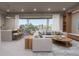 Open living space with modern furniture and city views at 1150 Windsong Ln # 200, Sarasota, FL 34242