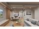Modern living room with hardwood floors and open floor plan at 1150 Windsong Ln # 200, Sarasota, FL 34242