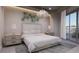 Bright bedroom with a king-size bed and en-suite bathroom at 1150 Windsong Ln # 300, Sarasota, FL 34242