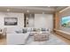 Bright and airy living room with a comfortable sectional sofa at 1150 Windsong Ln # 400, Sarasota, FL 34242