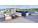 Relaxing rooftop terrace with fire pit and plunge pool at 1150 Windsong Ln # 400, Sarasota, FL 34242