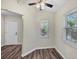 A versatile bonus room with plenty of natural light and wood floors at 318 Chartley N Ct, Sarasota, FL 34232