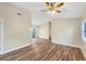 Spacious living room with wood floors, neutral walls, and plenty of natural light at 318 Chartley N Ct, Sarasota, FL 34232