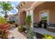 Relaxing front porch with seating and landscaping at 11569 11Th E Ave, Bradenton, FL 34212