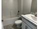 Clean bathroom with a bathtub, toilet and vanity at 2738 N Chamberlain Blvd, North Port, FL 34286