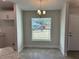 Casual dining area with a window seat and chandelier at 2738 N Chamberlain Blvd, North Port, FL 34286