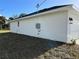 Side view of house and garage at 2738 N Chamberlain Blvd, North Port, FL 34286