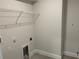 Laundry room with shelving and a utility sink at 2738 N Chamberlain Blvd, North Port, FL 34286