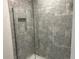 Walk-in shower with gray tile surround at 2738 N Chamberlain Blvd, North Port, FL 34286
