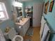 Bathroom with vanity, toilet, and shower at 4906 Sea Island Ave, Sarasota, FL 34234