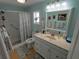 Clean bathroom, walk-in shower, and updated vanity at 4906 Sea Island Ave, Sarasota, FL 34234