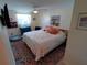 King-size bedroom with ample closet space and window at 4906 Sea Island Ave, Sarasota, FL 34234