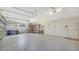 Spacious garage with ample storage, built-in cabinets, and a workbench at 7430 Weeping Willow Dr, Sarasota, FL 34241