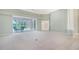 Bright Gathering room with view of the pool and patio at 7430 Weeping Willow Dr, Sarasota, FL 34241